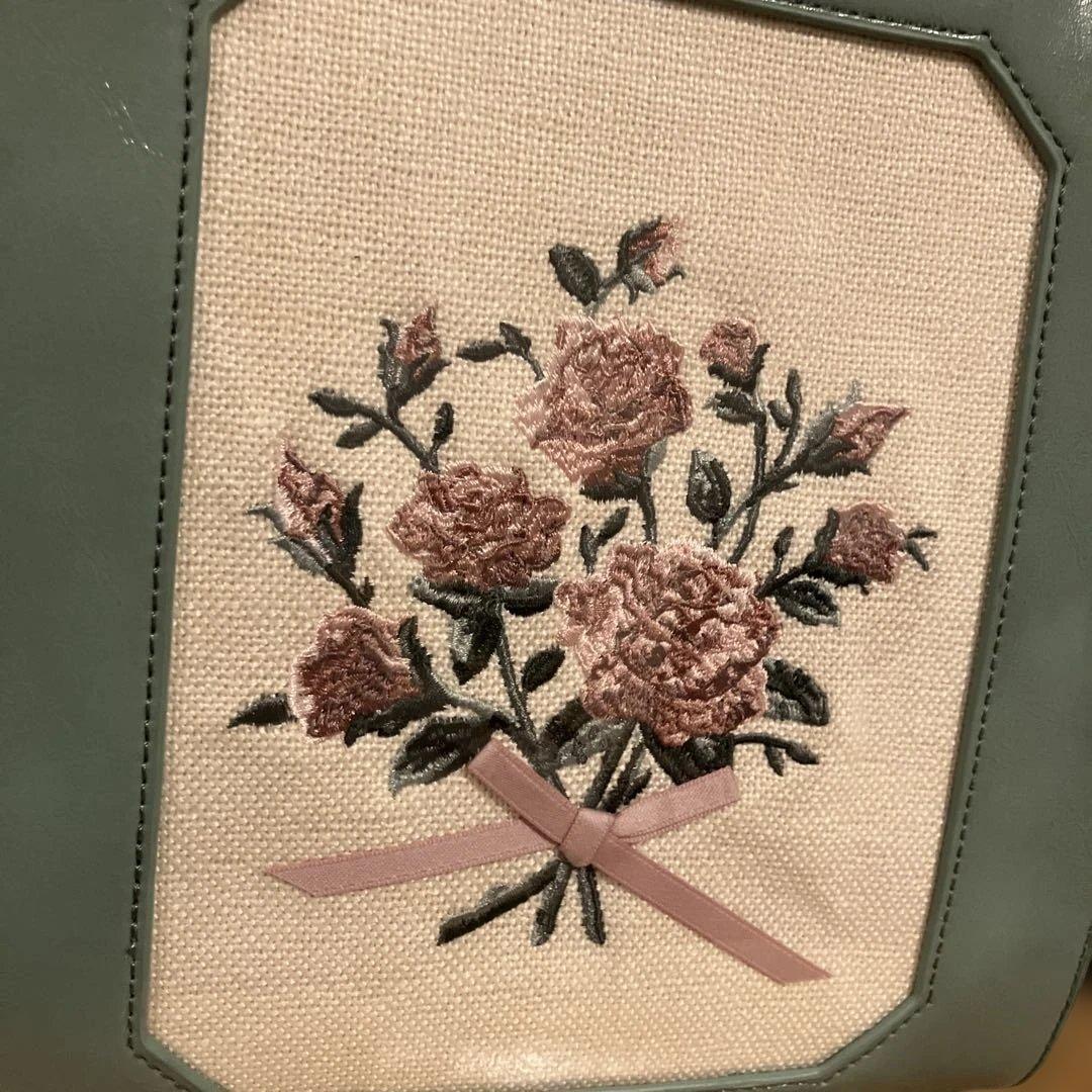 an another angelus　ブーケ刺繍スクエアがま口バッグ