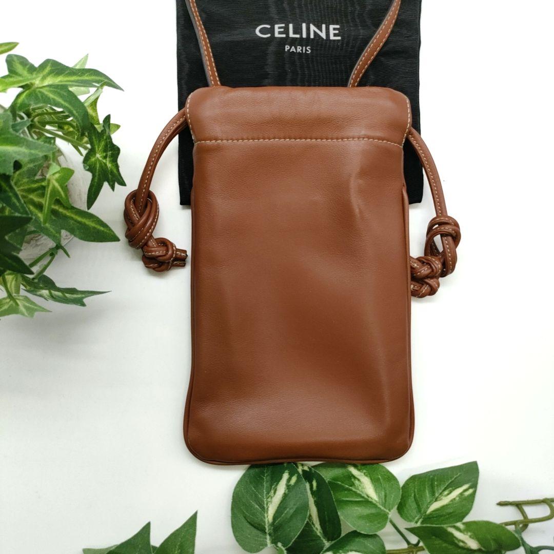 セリーヌ　モバイルケース　フォンホルダー　ドローストリング　キュイルトリオンフ