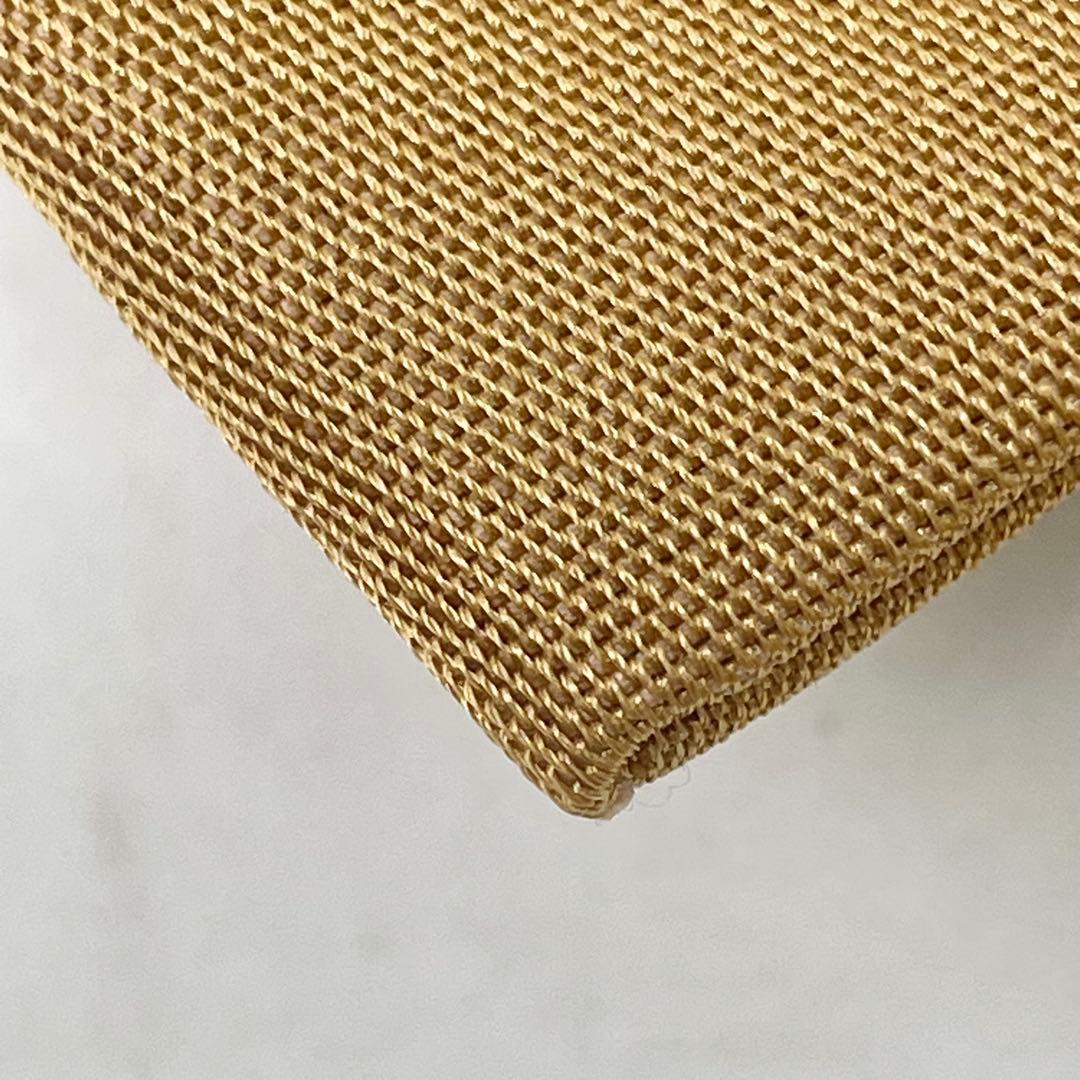 ［ 名古屋帯/ポリエステル ］化繊　柔らかい橙系の色　蝶　洗濯　洗える