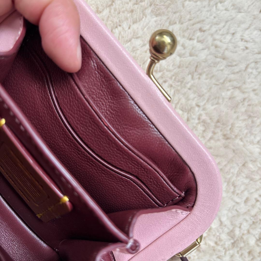 coach 薄いピンクのがま口ケース