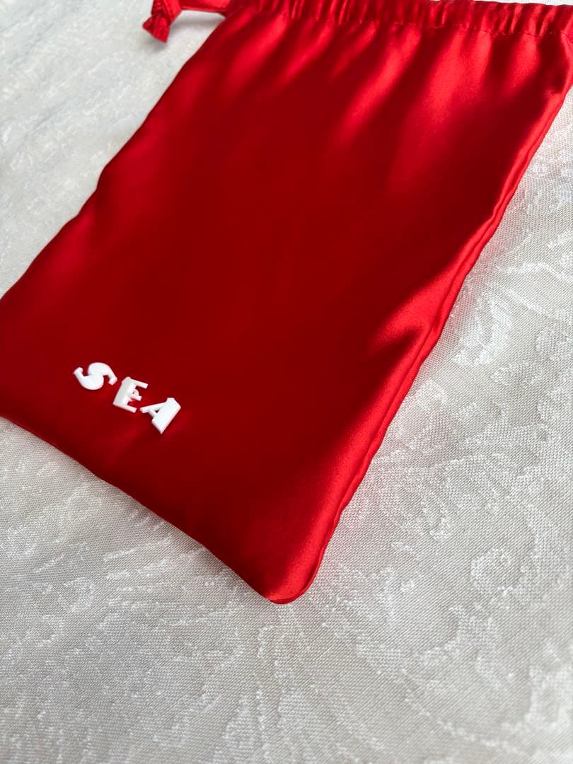 バッグ SEA SATIN \"KINCHAKU\" BAG (M) tomato