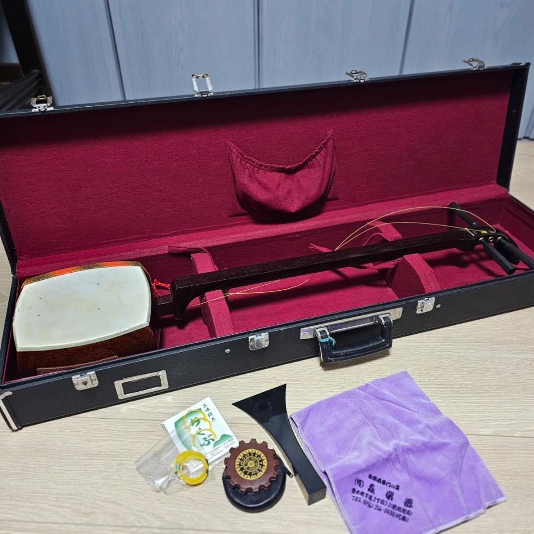 三味線 中棹 犬皮 紫檀 丸打胴 東サワリ 金細 ハードケース付