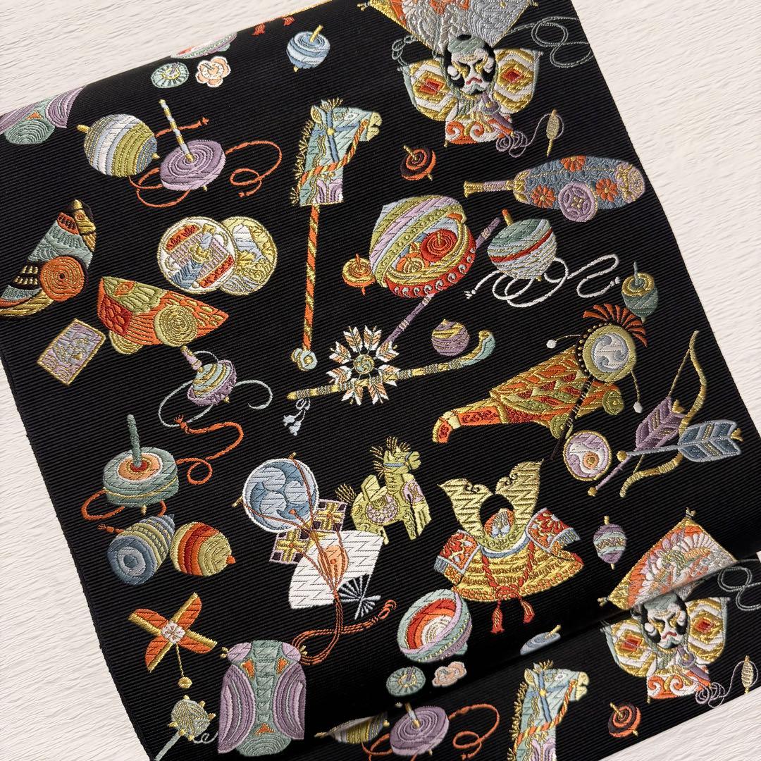 m-62 西陣 山下織物 遠野物語 袋帯 唐織 正絹 黒地 美品