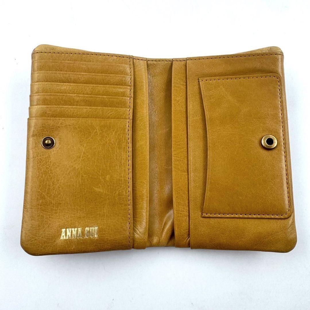 ANNA SUI　リトルバード　がま口　二つ折り財布　ゴールド金具　黄　レザー