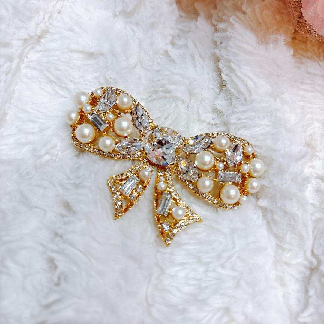Rene リボン型ブローチ ゴールド系 パール