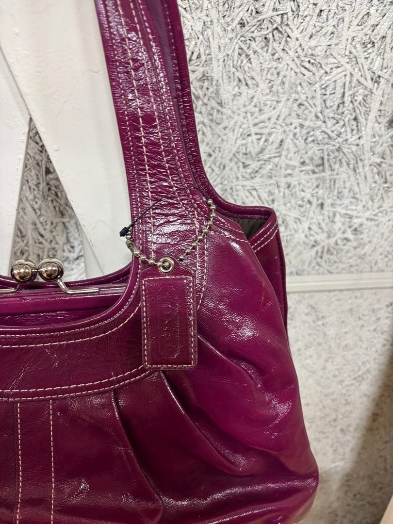 コーチ がま口ハンドバッグ