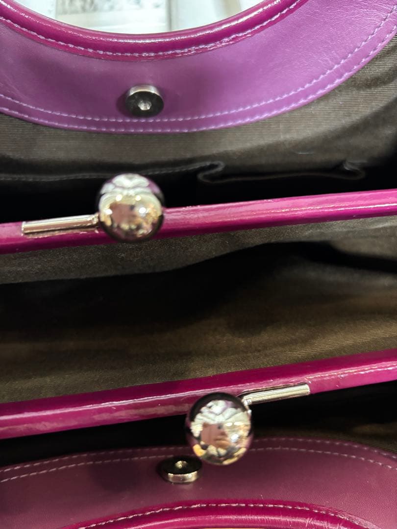 コーチ がま口ハンドバッグ