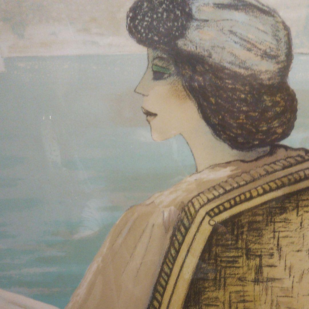 カシニョール 籐椅子の婦人