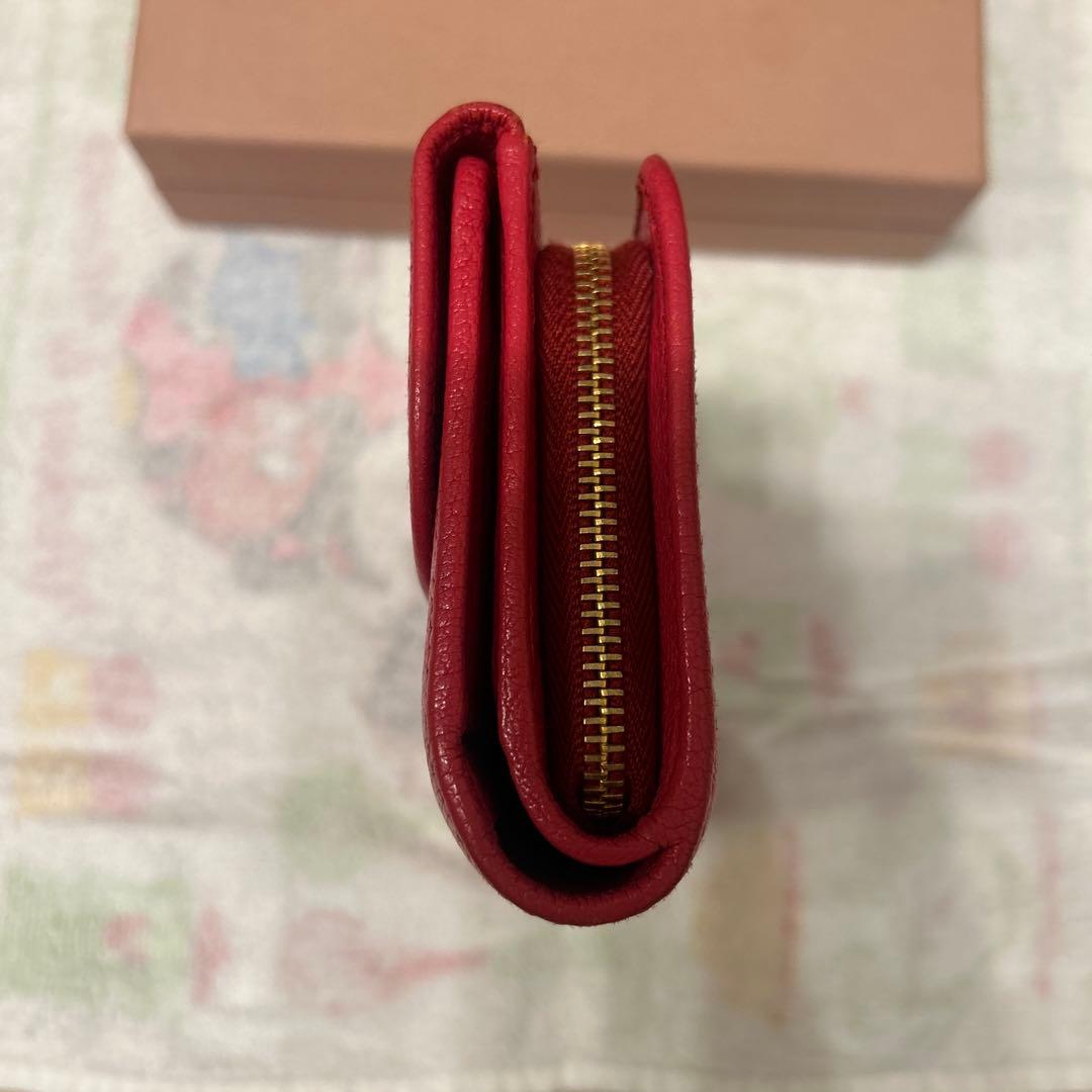 日曜日限定値下げMIU MIUピンク二つ折り財布