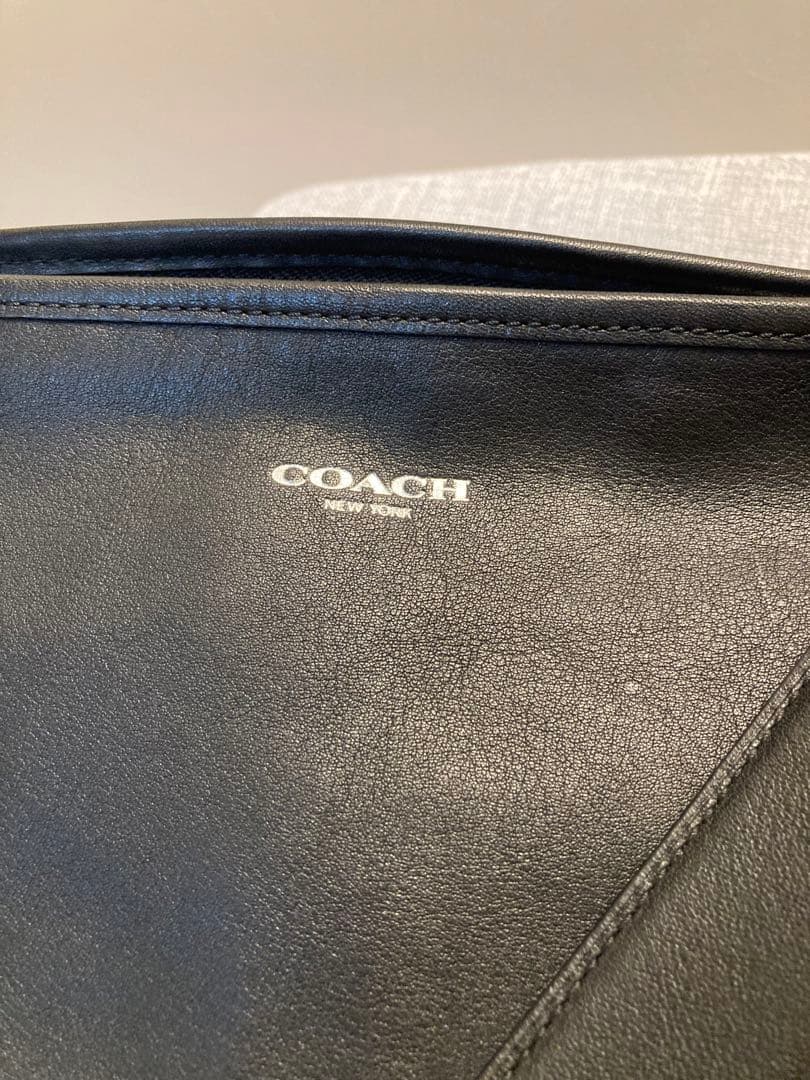 COACH ブラック ショルダーバッグ タッセル付き