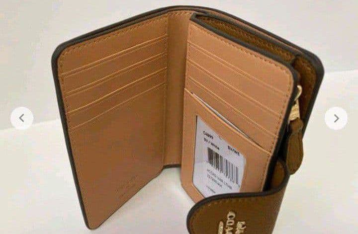 新品未使用コーチ二つ折り財布COACH×PEANUTSスヌーピーホワイト送料無料