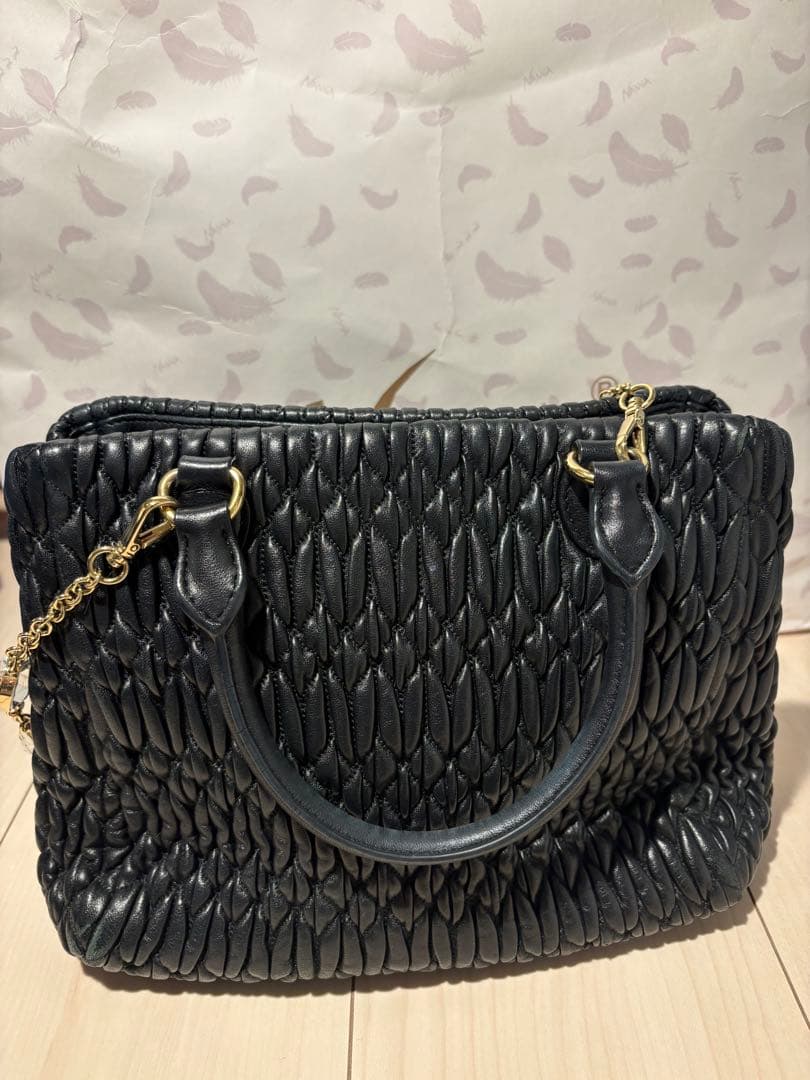 miumiuミュウミュウ ナッパクリスタル