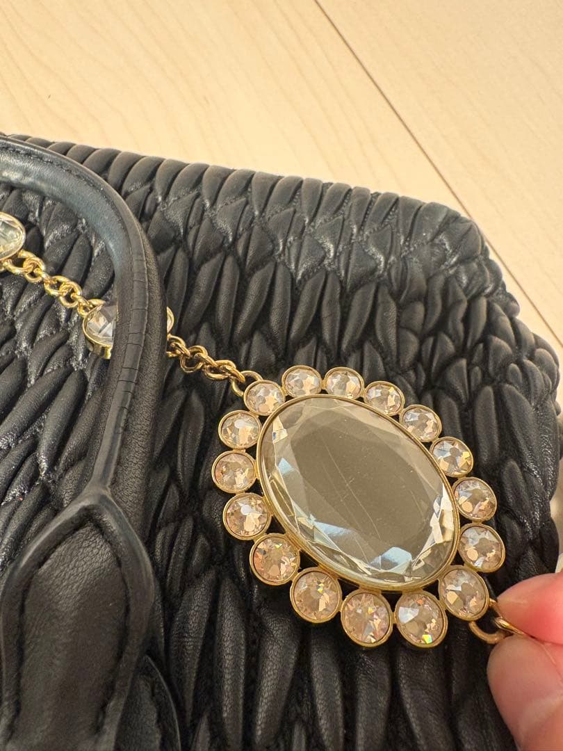 miumiuミュウミュウ ナッパクリスタル