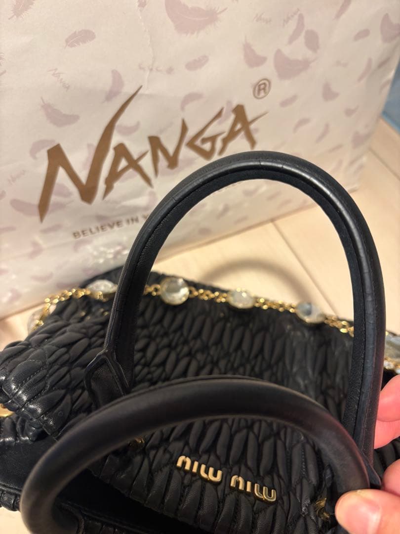 miumiuミュウミュウ ナッパクリスタル