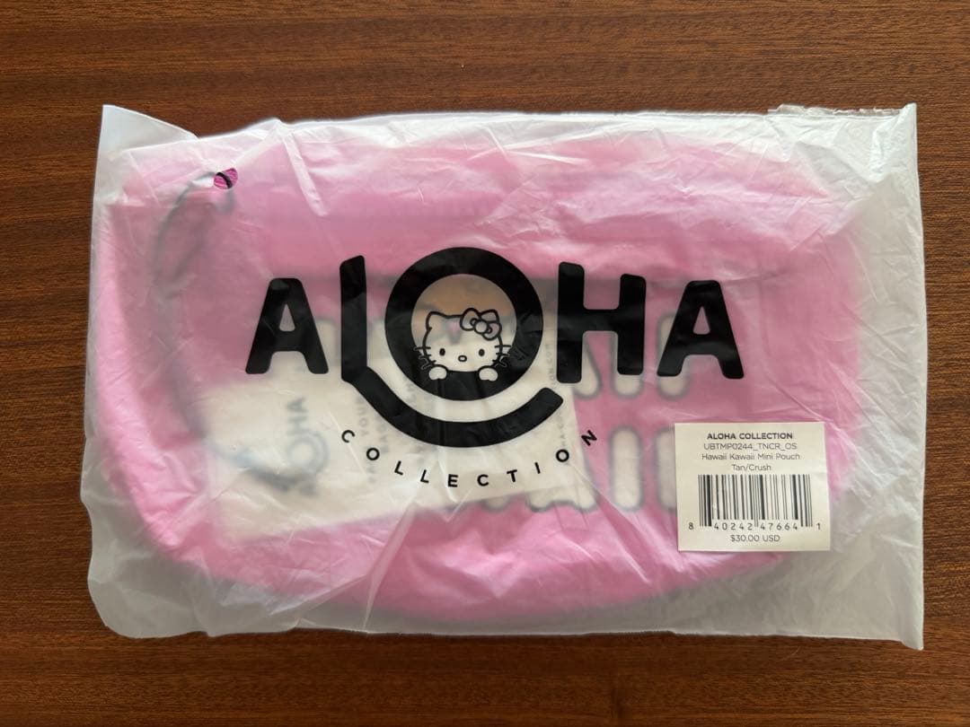 レア！アロハコレクション 日焼けキティ ハワイDFS限定 ポーチ ピンク