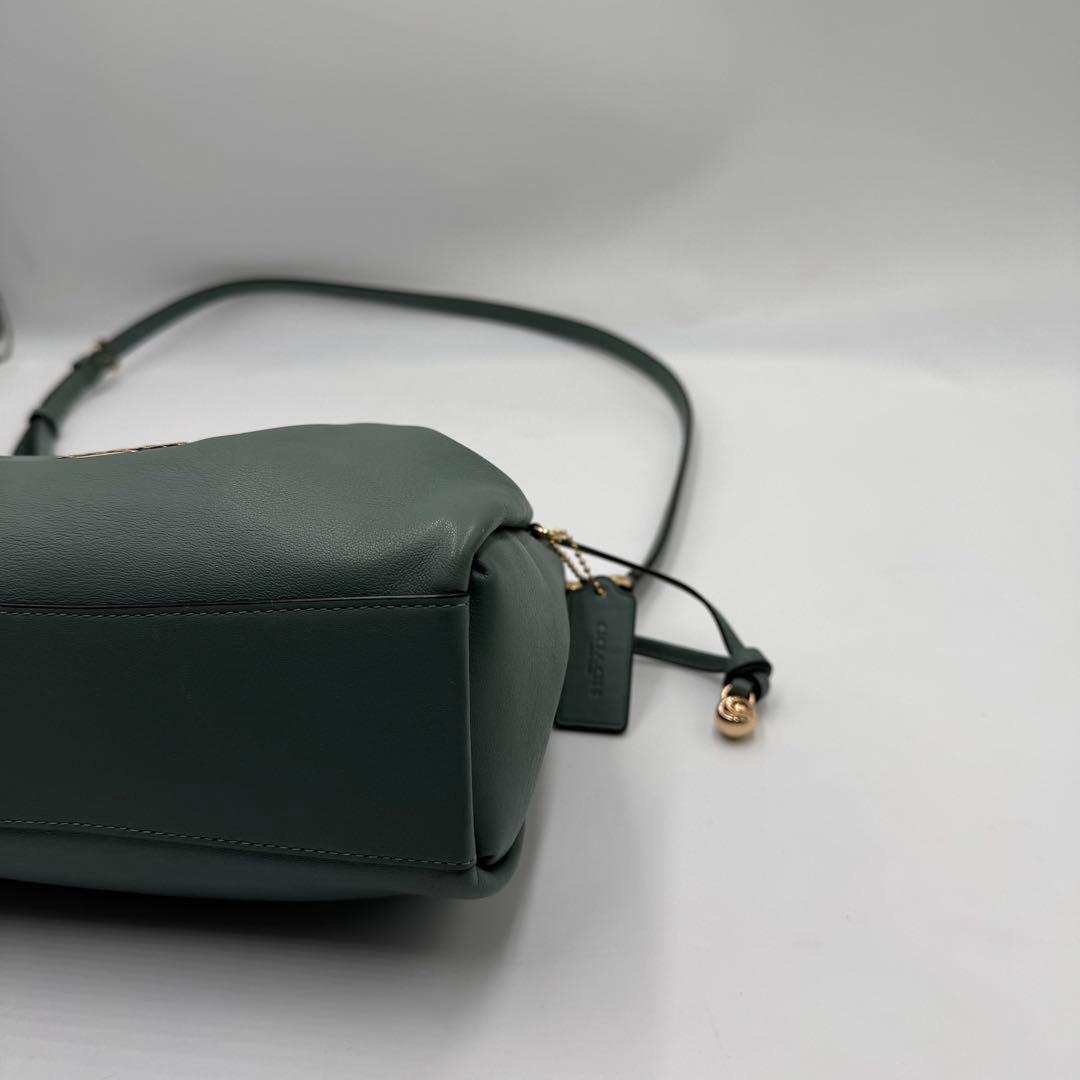 美品✨ コーチ フェイ ドローストリングバッグ レザー 巾着 ゴールド金具 水色