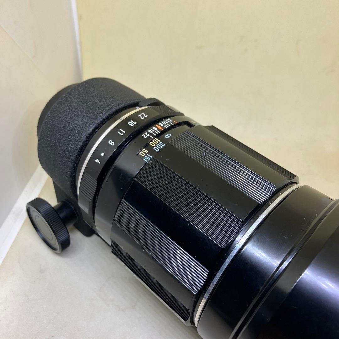 Super-Mult-Coated TAKUMAR 300mm F4になります。