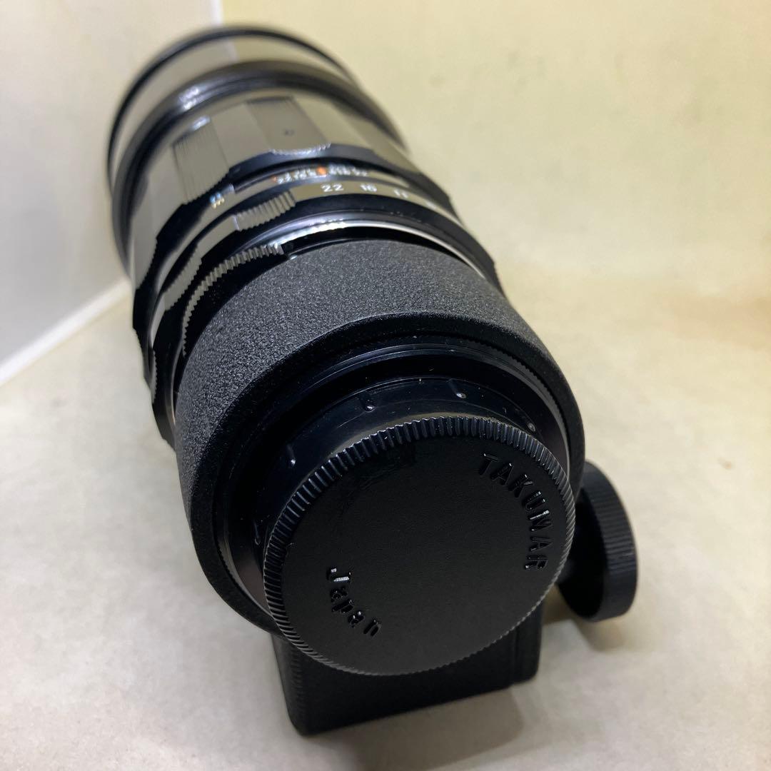 Super-Mult-Coated TAKUMAR 300mm F4になります。