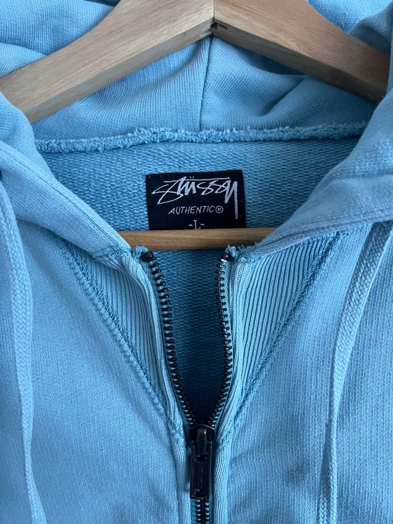 STUSSY ライトブルー ジップアップパーカー Lサイズ