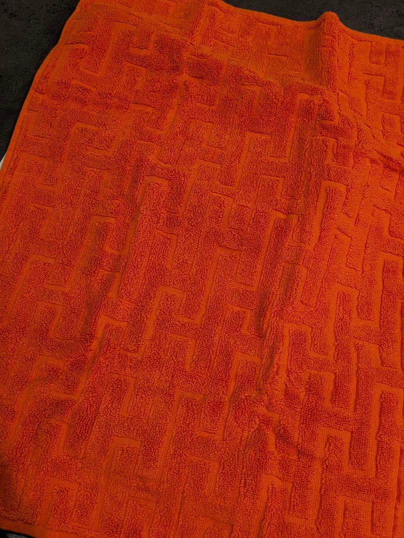 HERMES オレンジ フェイスタオル《ステアーズ》