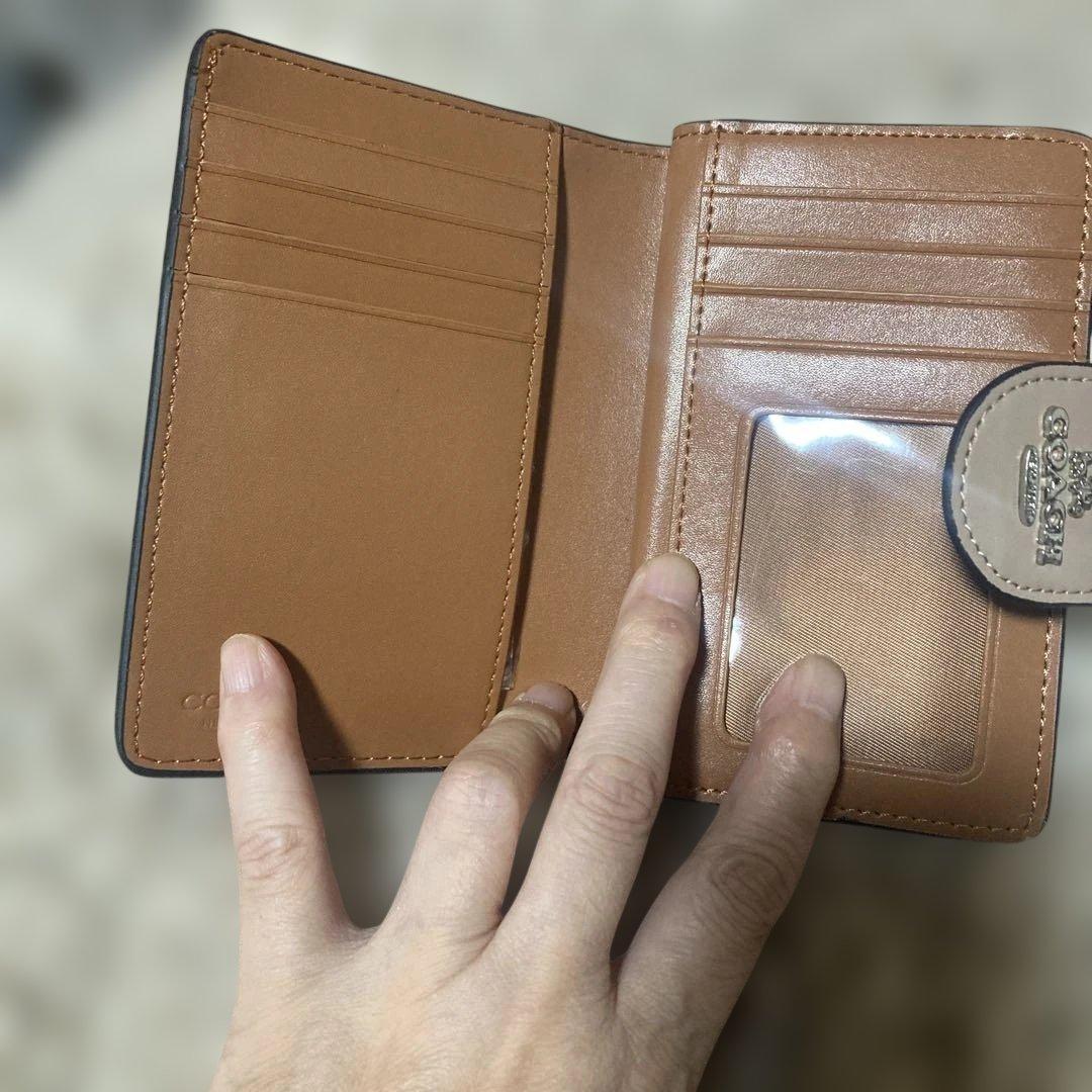 新品】コーチ ミディアムコーナージップウォレット・フローラルプリント