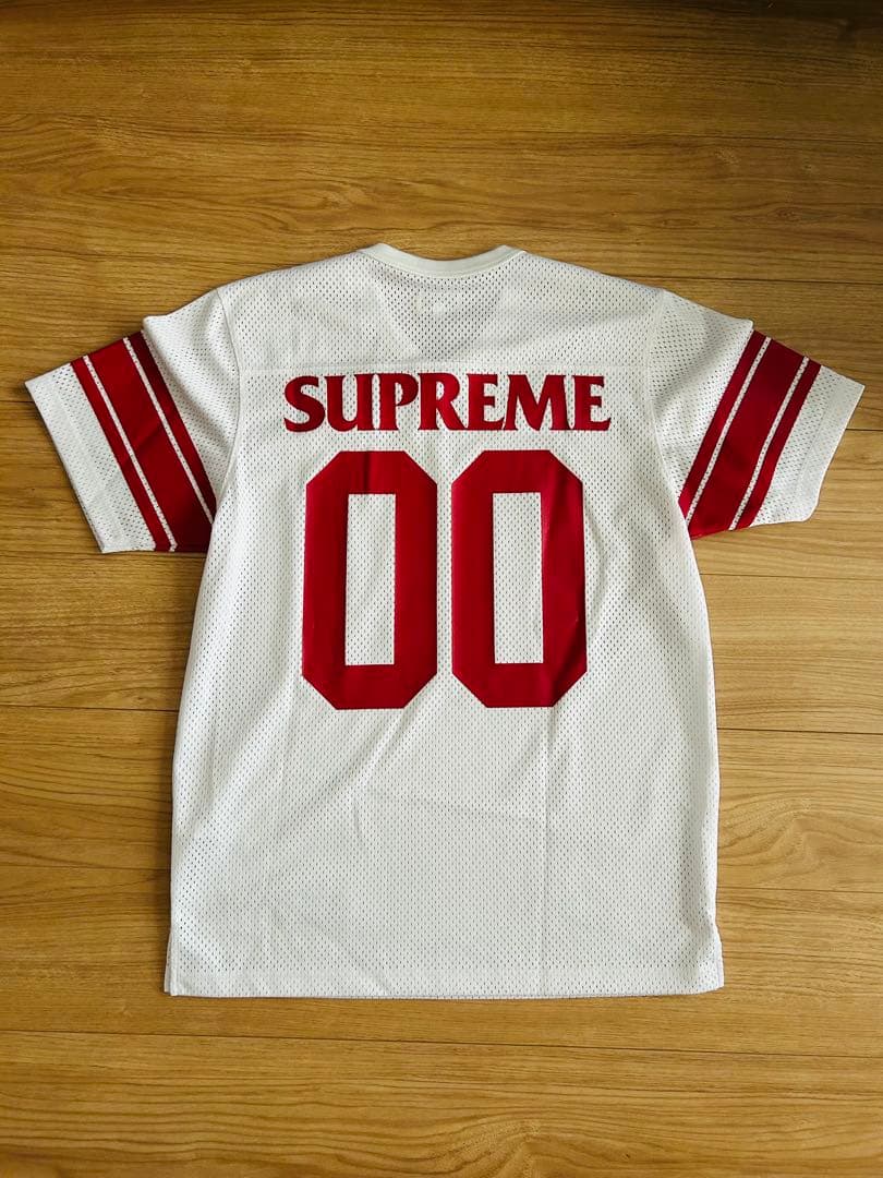 トップス supreme anti hero football