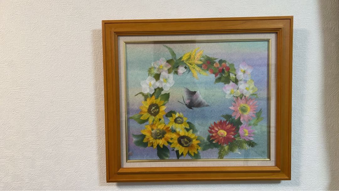 睡蓮と花のリースの絵画