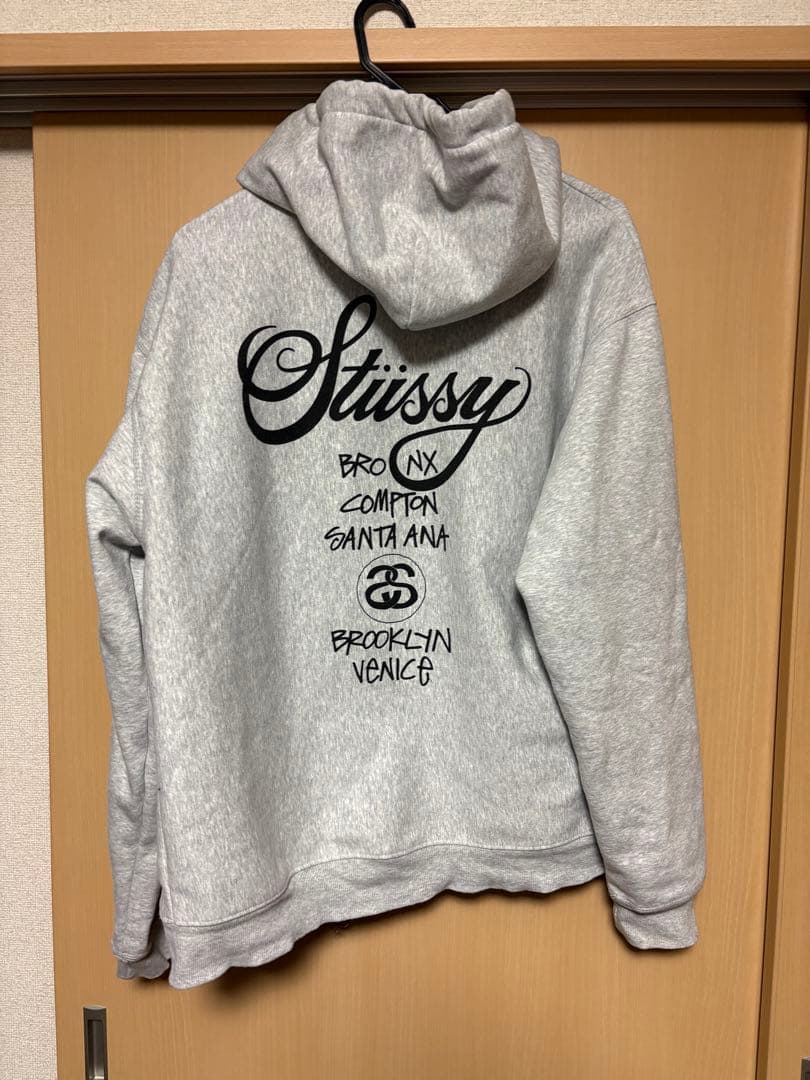 Stüssy グレー パーカー Lサイズ バックプリント