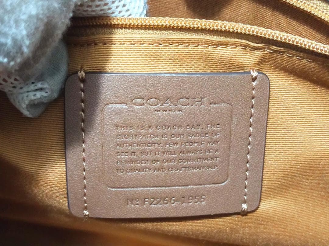 【中古】COACH　デンプシー キャリーオール シグネチャー キャンバス