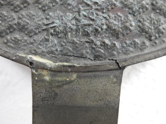 銅鏡　丸に花角　M687