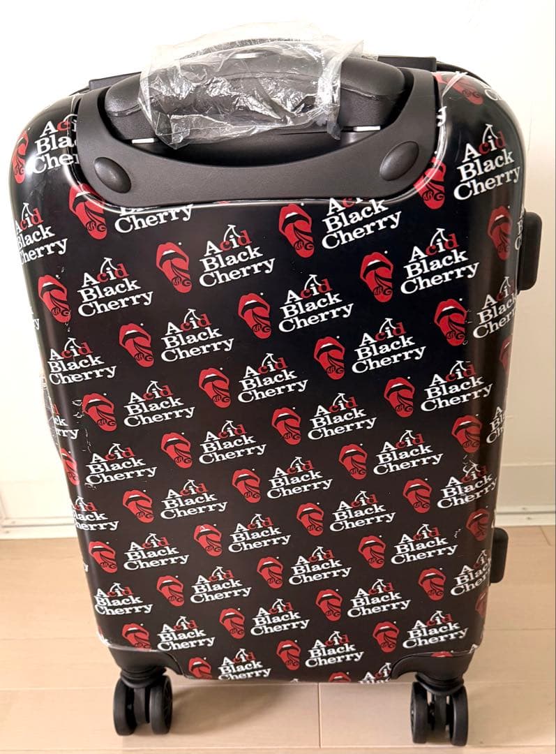 仮*病様 Acid Black Cherry キャリーケース