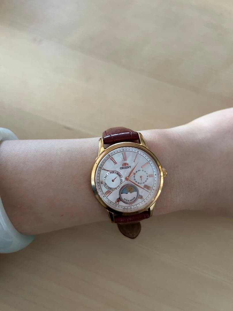 ORIENT 「太陽と月」パールダイヤル レッドレザー レディースクォーツ