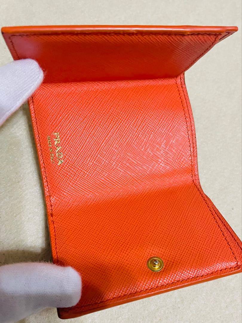PRADA オレンジ 三つ折り財布