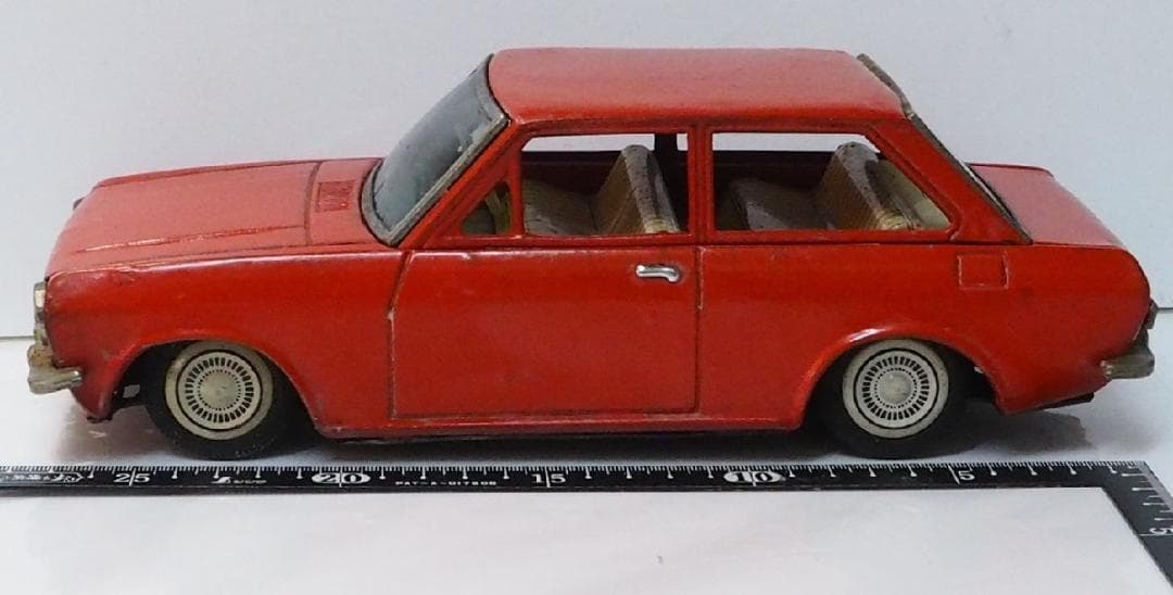 増田屋【ダットサン サニー 1000 リペイント橙】当時物ブリキ製ミニカー 箱無