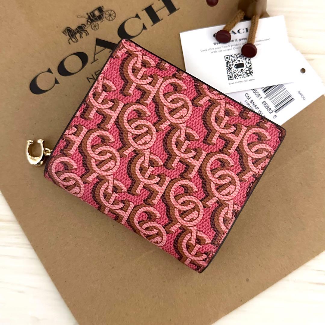 COACH コーチ　折り財布　ピンク　二つ折り財布 COACH柄
