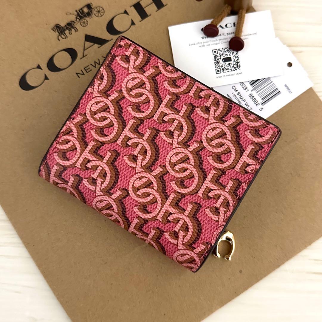 COACH コーチ　折り財布　ピンク　二つ折り財布 COACH柄