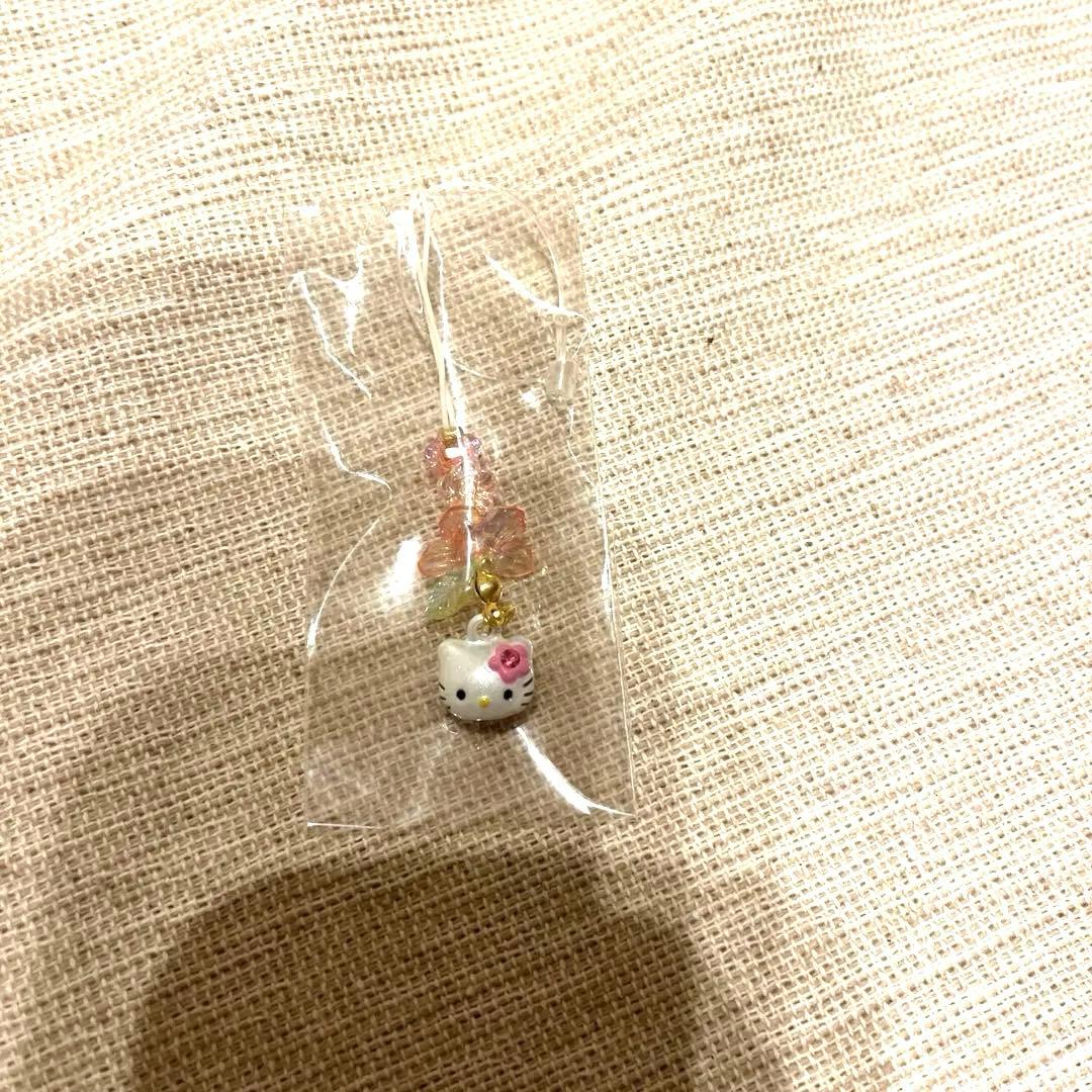 ハローキティ 鈴フラワービーズストラップ ピンクのラインストーン花付き