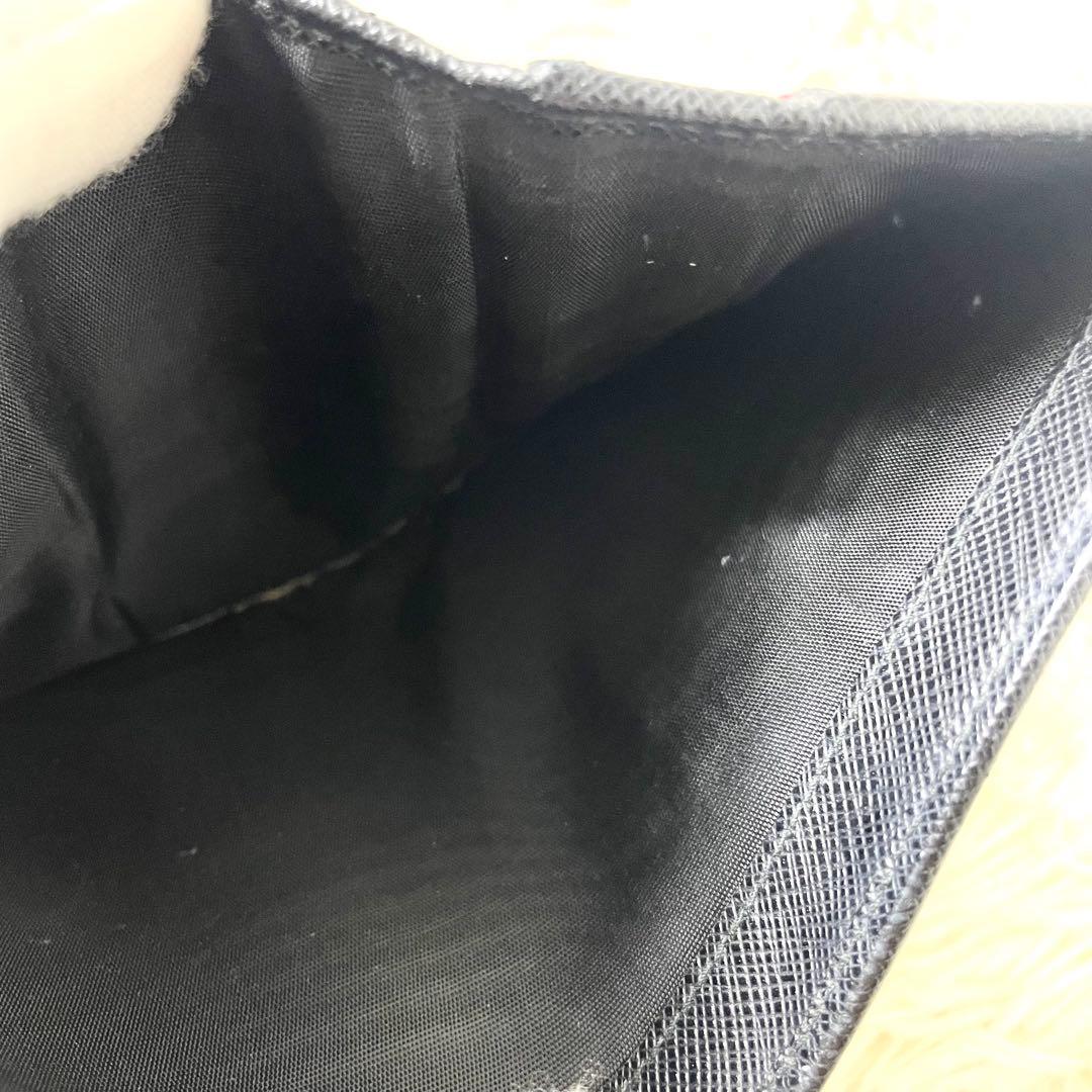 プラダ　PRADA 二つ折り財布　サフィアーノ　ブラック　黒　ゴールド