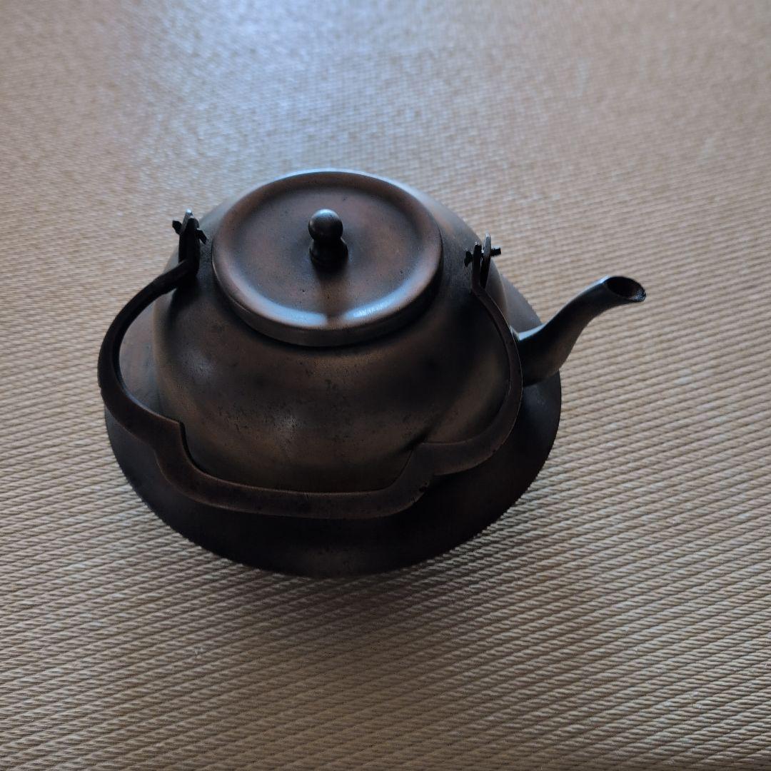 銅色丸型真鍮瓶？ 固定式取っ手付き