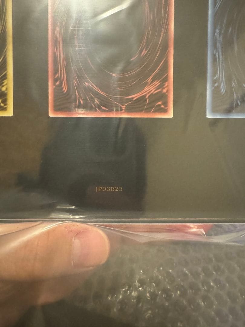 遊戯王カードゲーム25周年記念商品「三幻神」（ステンレス製）