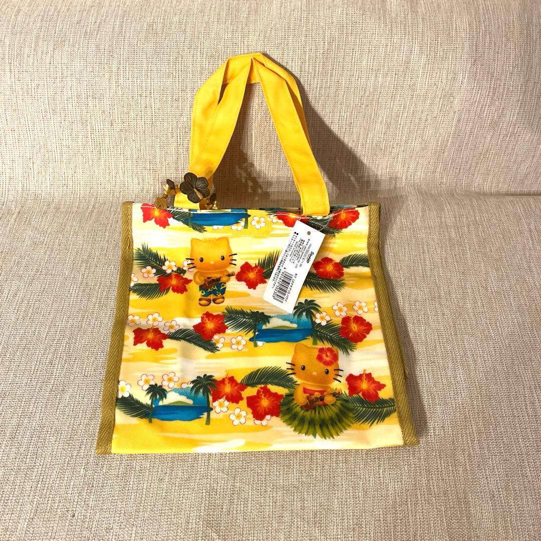 激レア‼️日焼けキティハワイアンバッグ 新品未使用品、ハイビスカスチャーム付き