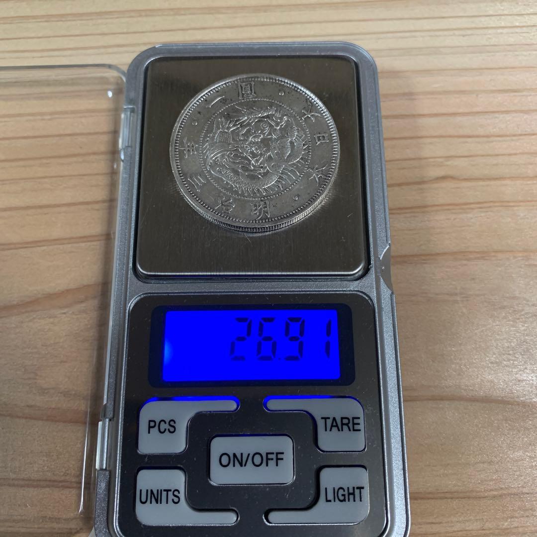 一圓銀貨明治三年　半欠貝園