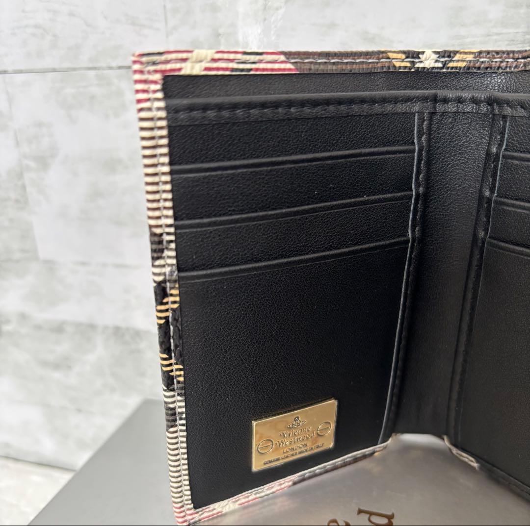 vivian westwood がま口 二つ折り スモールフレームウォレット