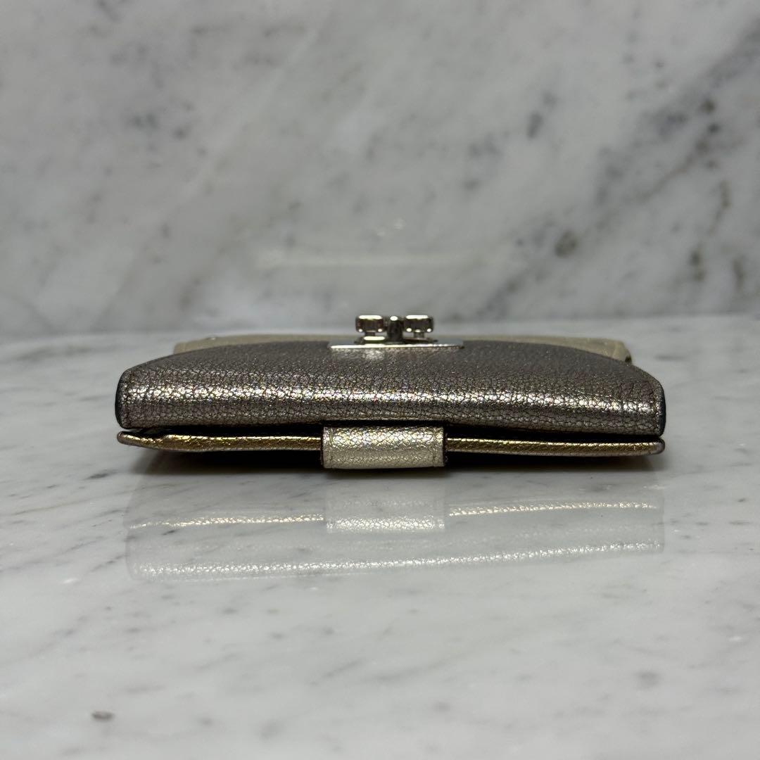 サルヴァトーレフェラガモ ゴールド シルバー 二つ折り財布 ガンチーニ