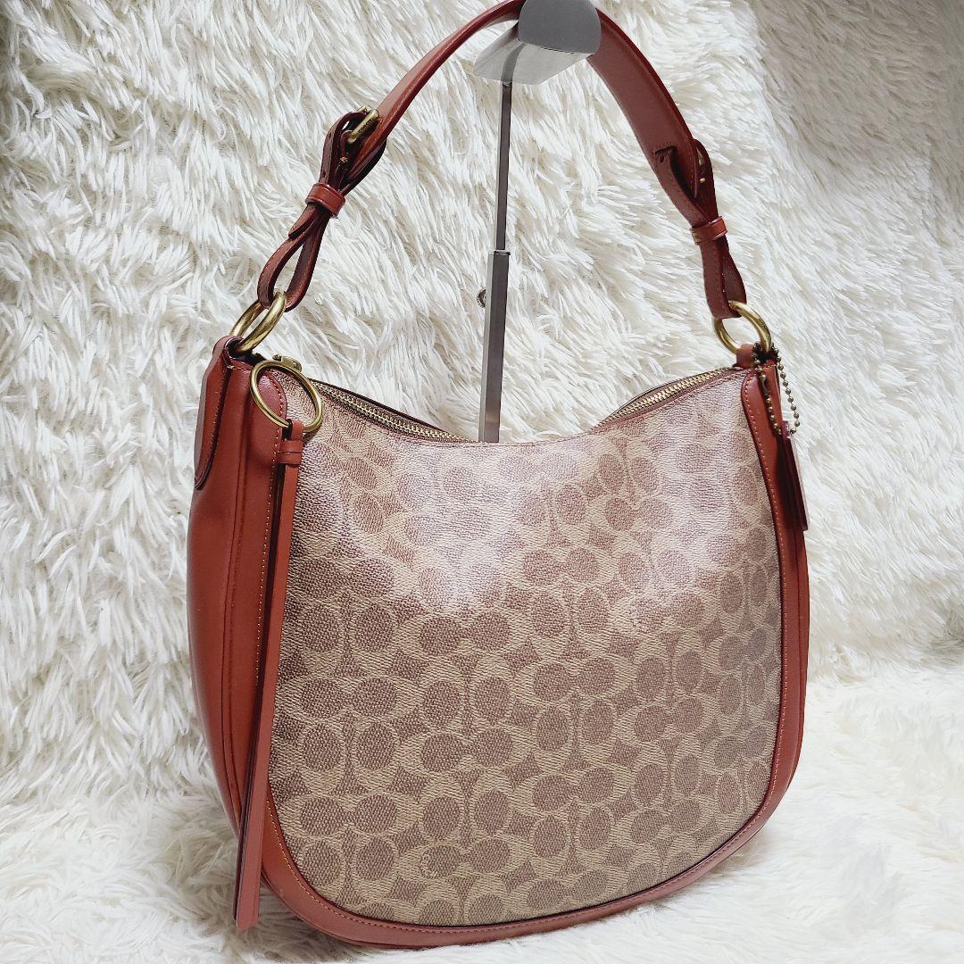 コーチ　ハンドバッグ　サットン　ホーボー　シグネチャー　PVC　レザー