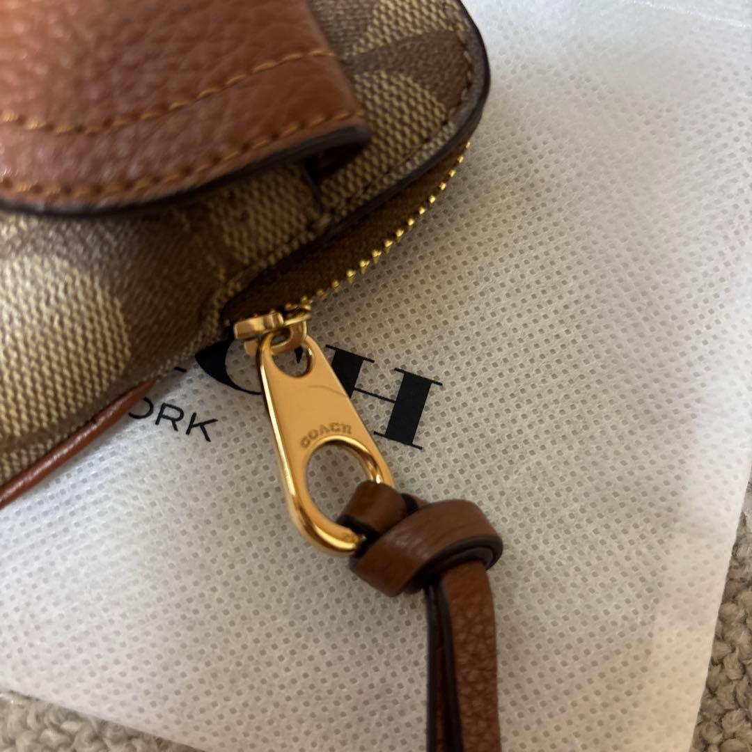 COACH ケース ブラウン　シグネチャー　ペニー