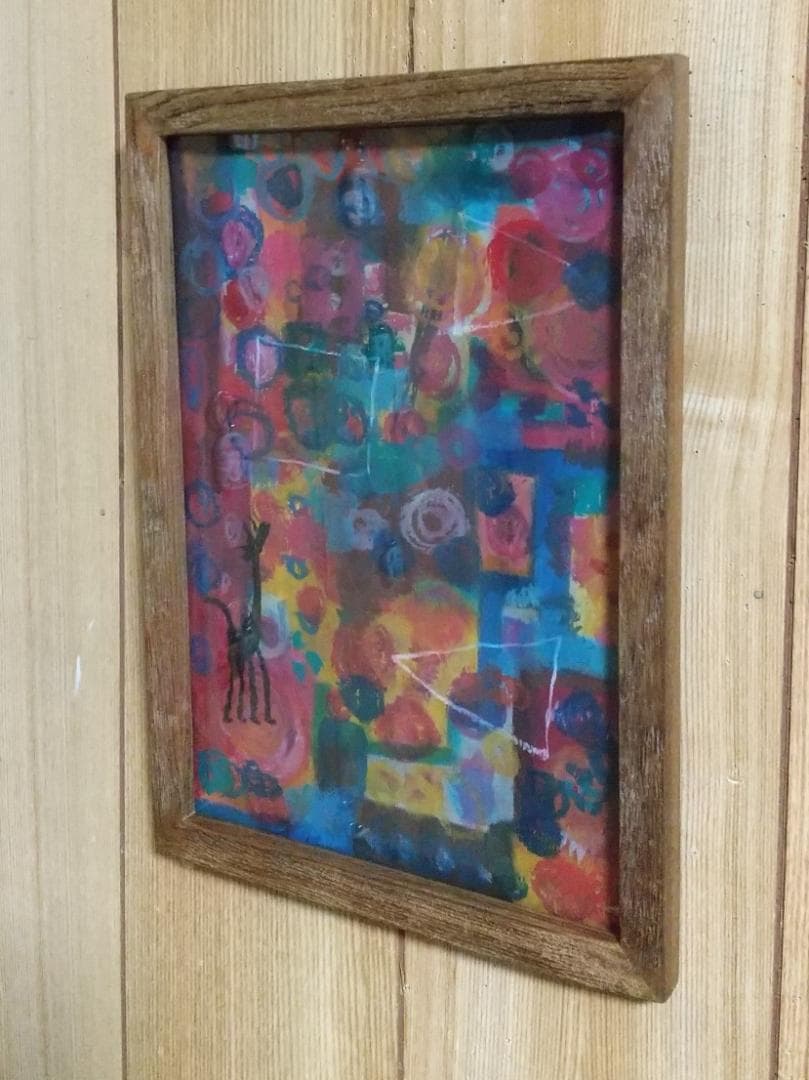 カラフルなクレパス画 キリンのシルエット