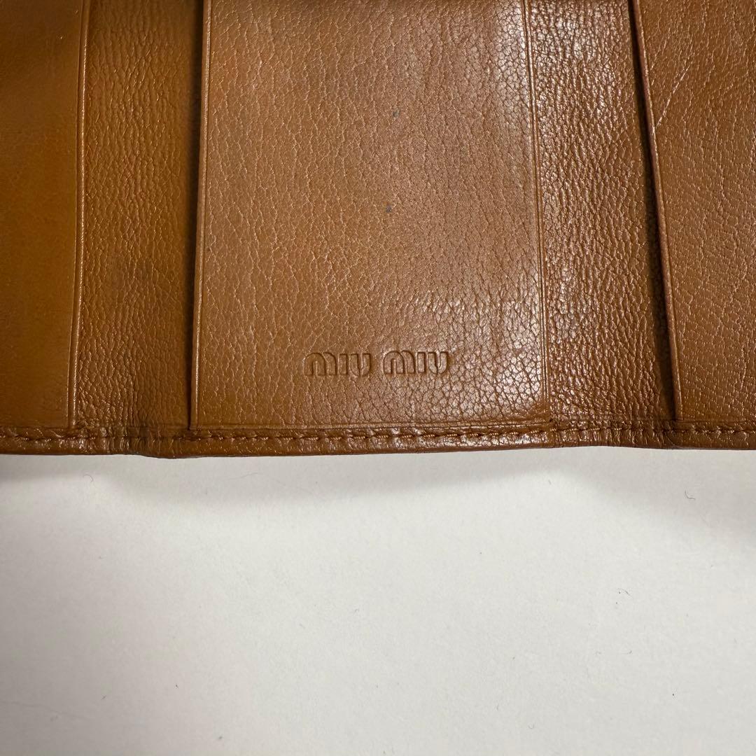 小物 MIUMIU studs leather key case