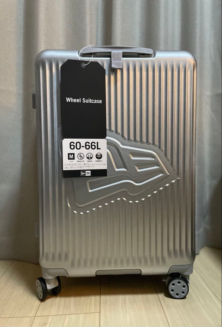 NEW ERAキャリーケース 60-66Lシルバー