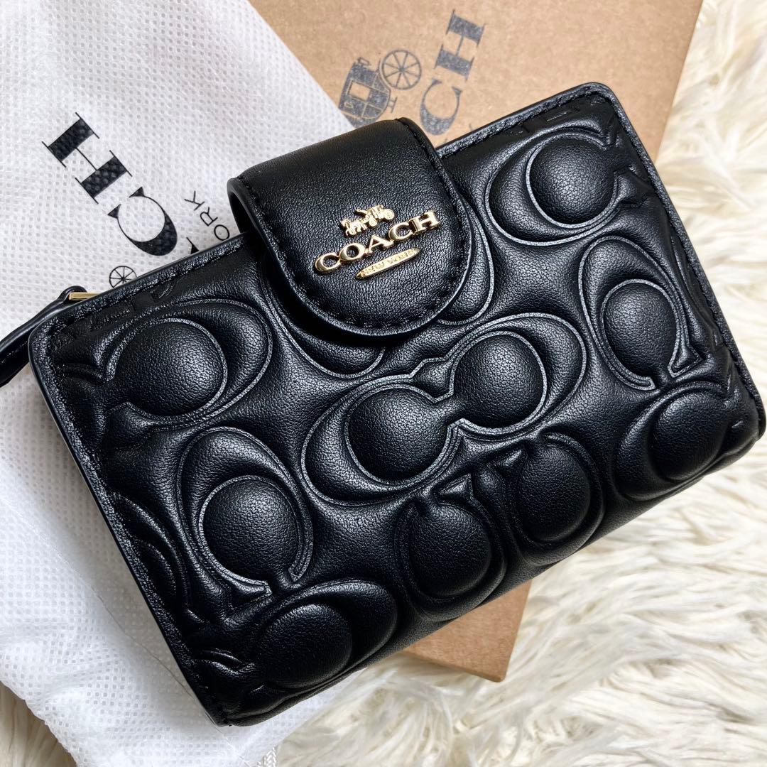 【未使用】 COACH 二つ折り シグネチャーエンボス